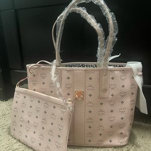Pink MCM BAG. Never been worn. Purchased in May as a gift.
